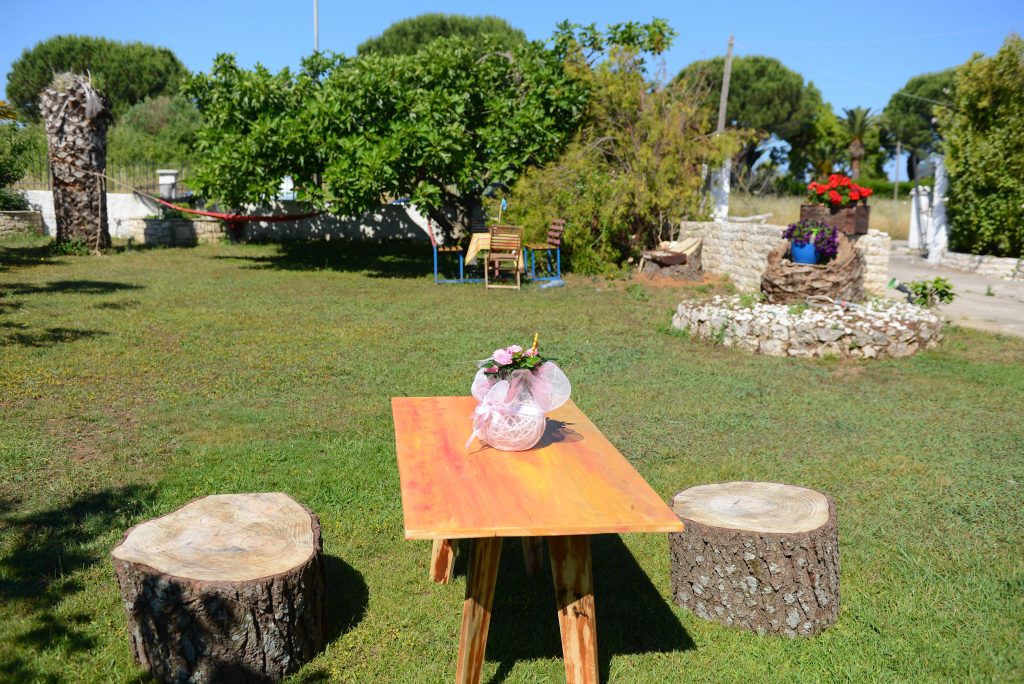 villa-anna-corfu-garden-wooden-table